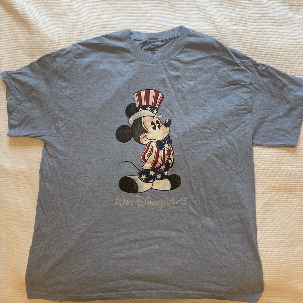 Walt Disney Word light blue t-shirt.
